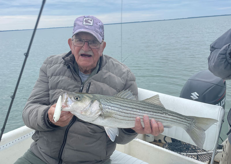 chuck prahl with a rockfish caught on topwater