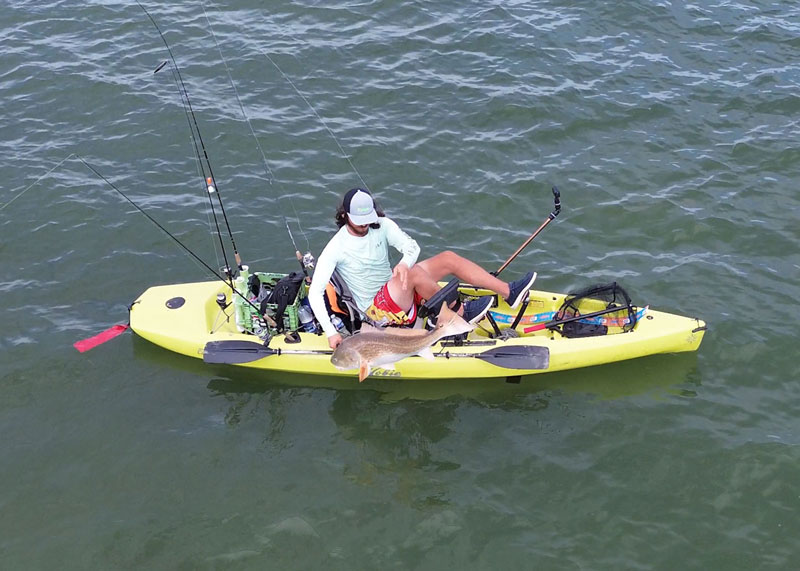 angler using a drone while fishing