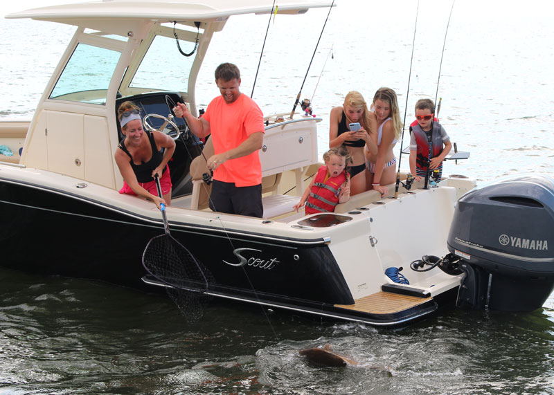 family fishing catching black drum