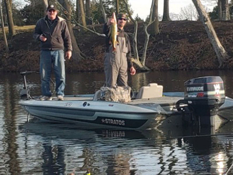 boat anglers with a pickerel
