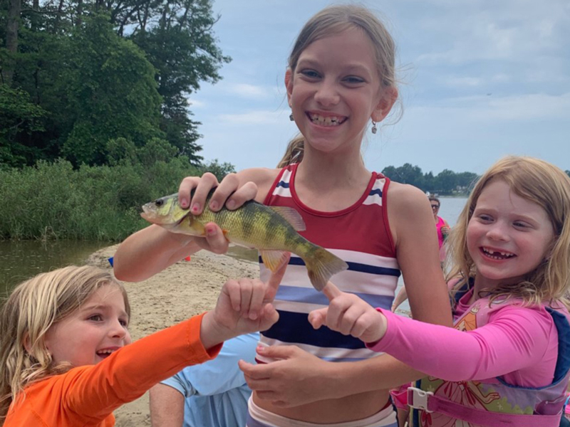 kids catch a yellow perch