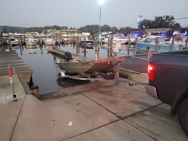 launching a boat at the boat ramp