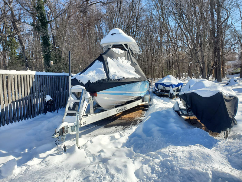 a boat covered in snow
