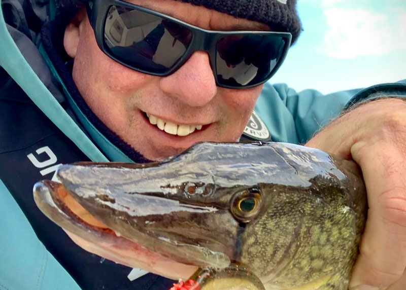 tom weaver holding a pickerel